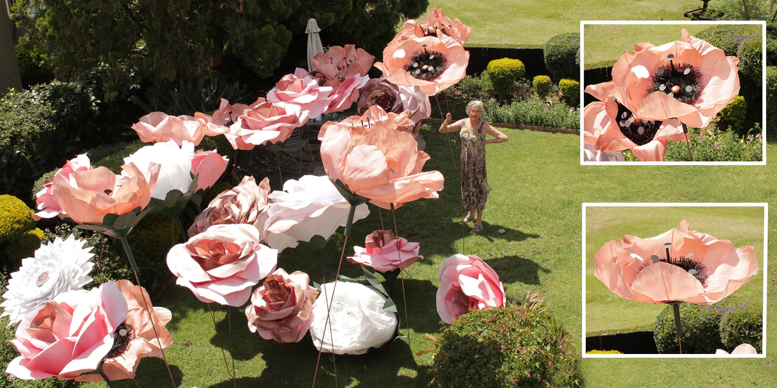 Oversized pink paper roses in a garden