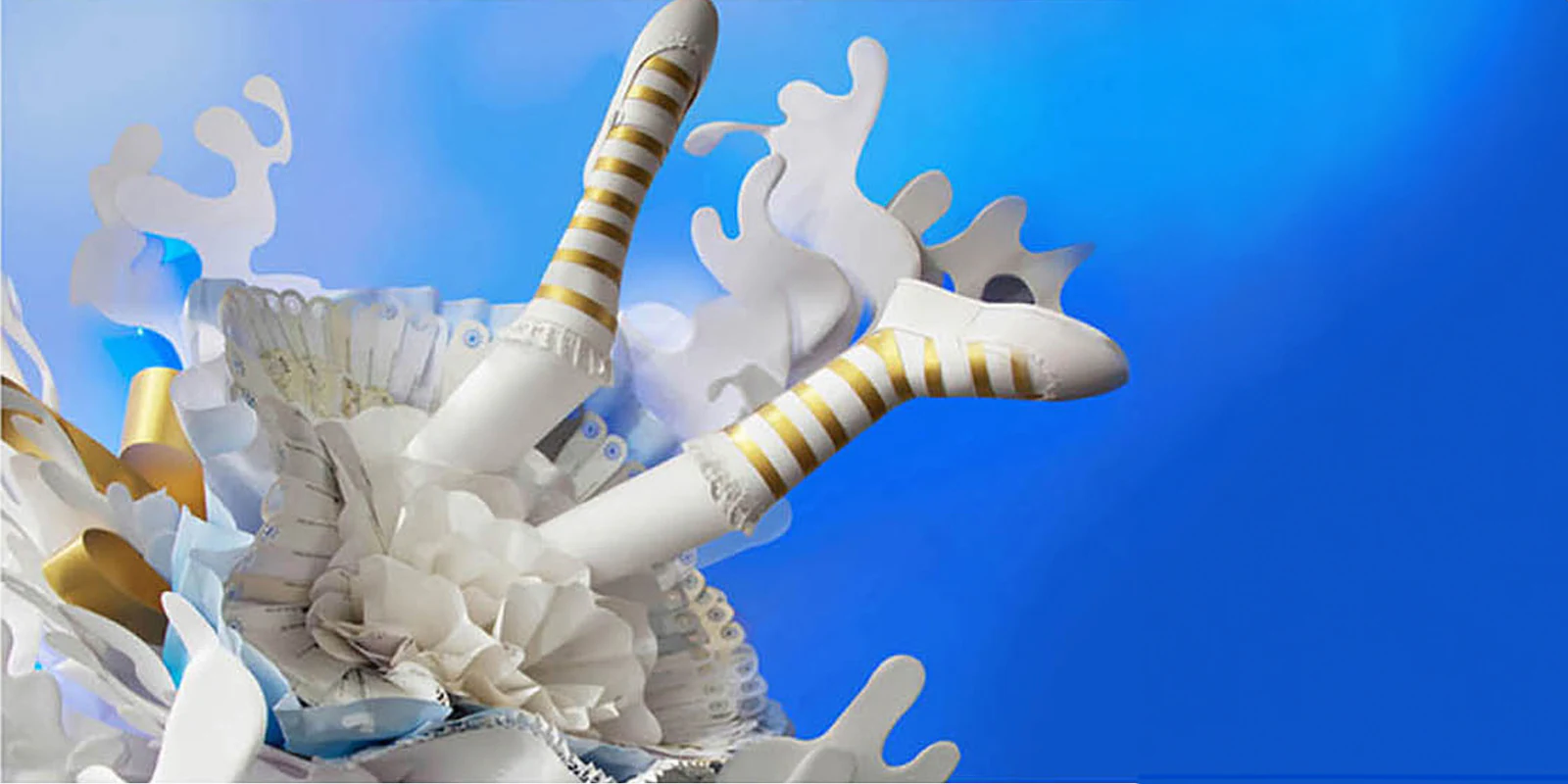 Alice in Wonderland exhibition piece: white paper legs and waves on blue