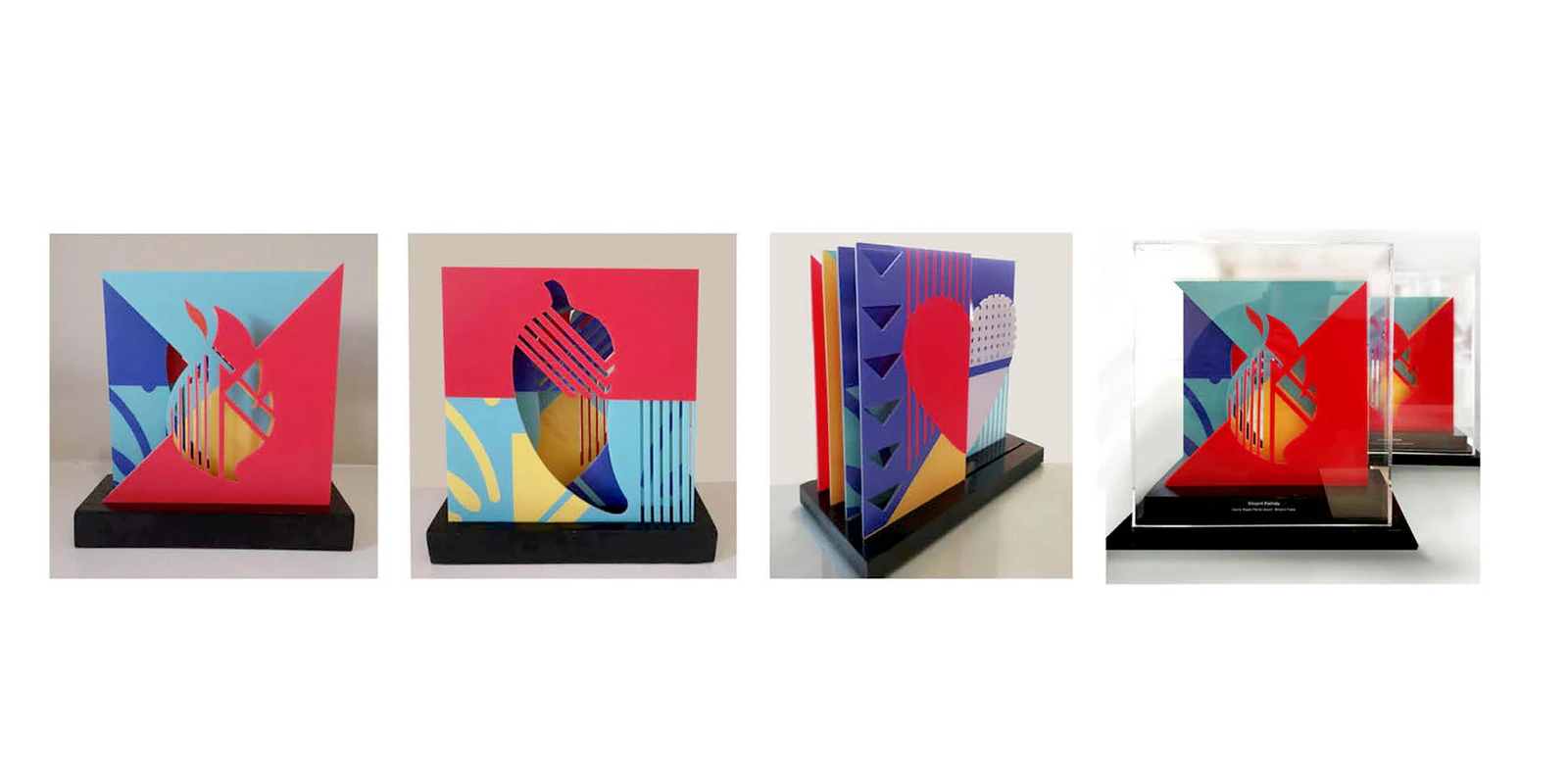A row of colourful paper trophy designs